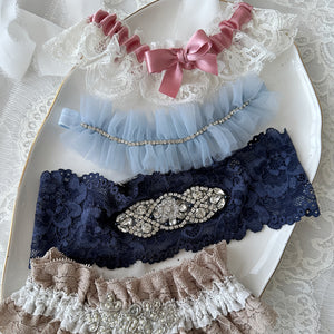 Small to medium - blue lace wedding garter set
