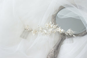 Bridal hair piece for updo with white flowers, pearls and silver leaves