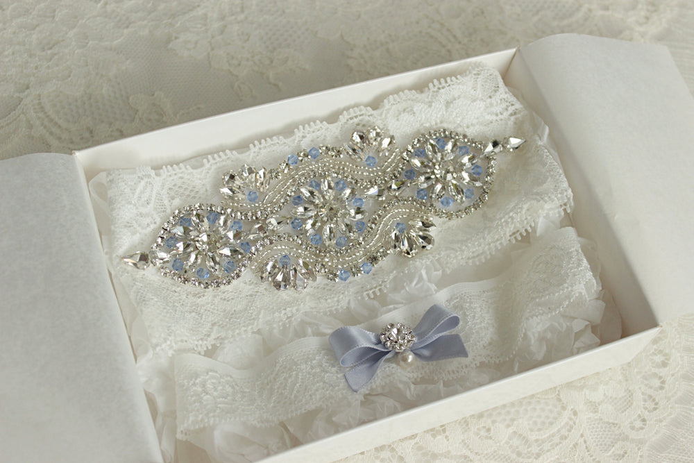 
            
                Load image into Gallery viewer, White Lace Wedding Garter with Light Blue Crystals - Something Blue
            
        