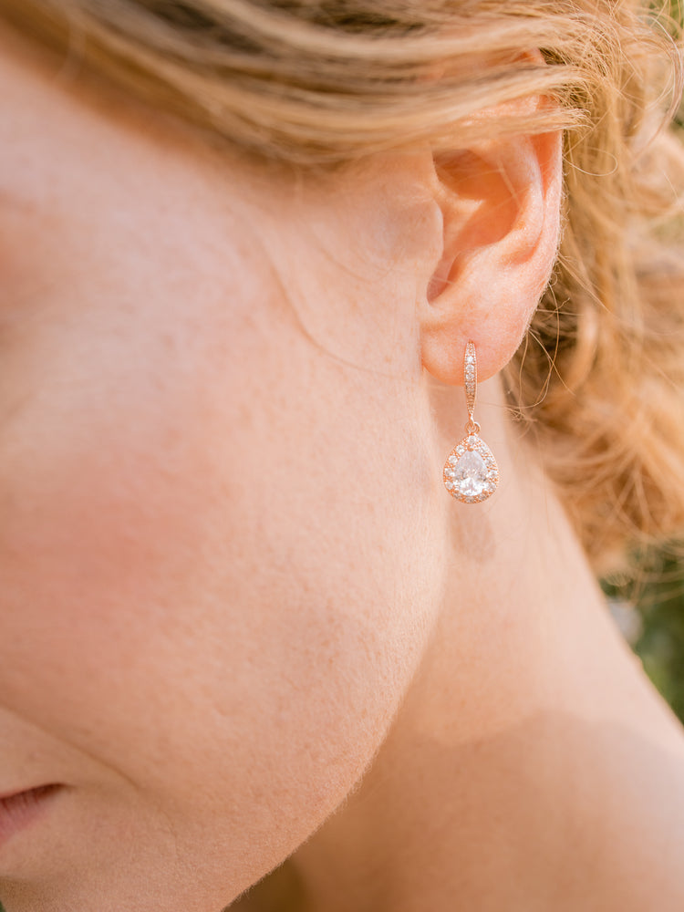 Rose gold crystal drop pear bridal earrings with halo