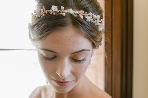 Bridal flower crown in rose gold with leaves, pearls and flowers.